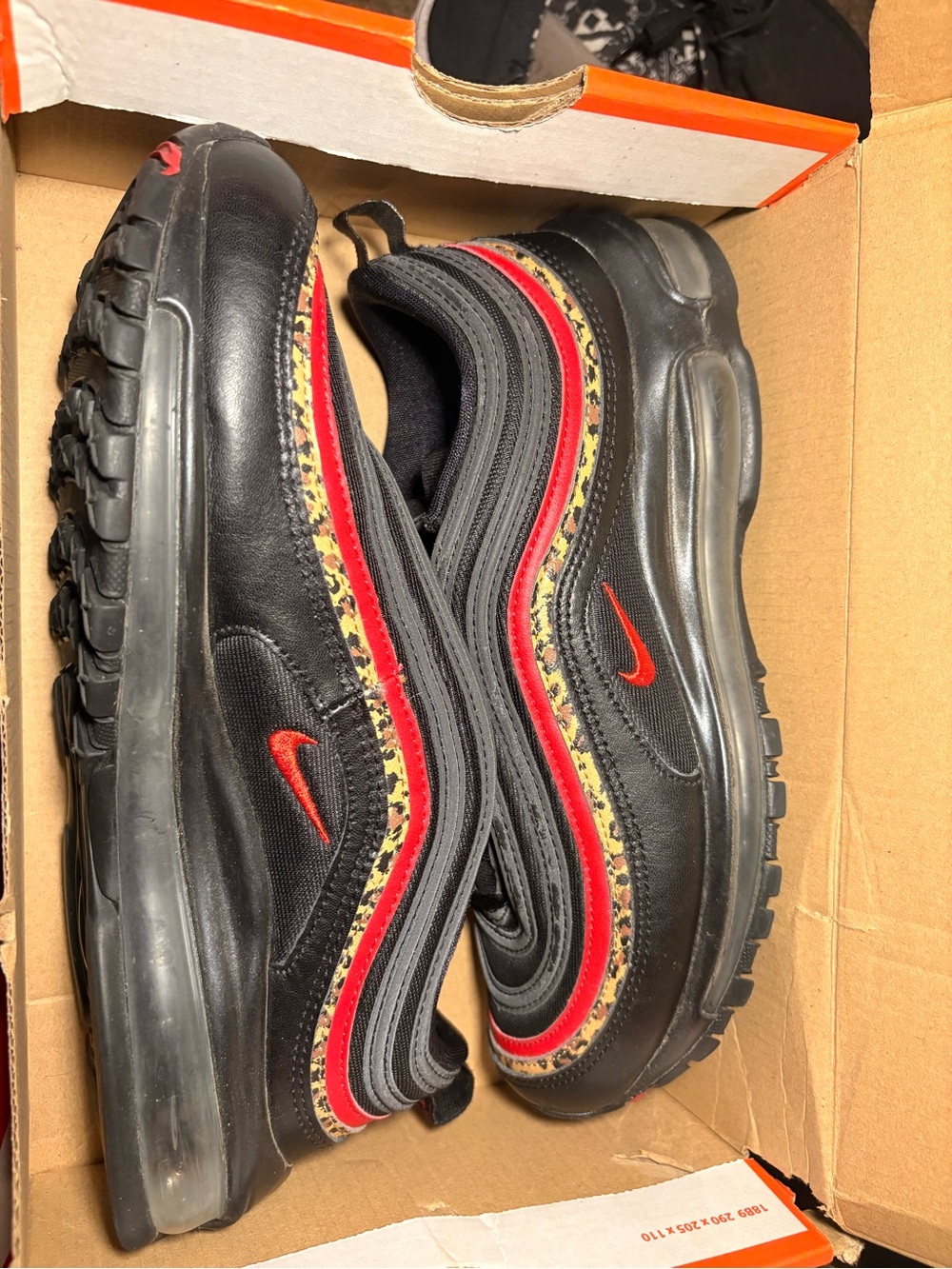 Nike Black Sneakers with Red Swoosh and Leopard-Print Trim
